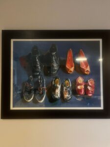 Ainslie Roddick shoes family connection growth high heels black dress shoes plimsols red mary janes blue background painting oil contemporary