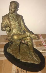 Seated man in reflective pose, bronze, sold-out edition (front)