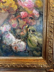 Close-up of a floral painting by Jose Royo titled 'Cesta de Flores' with ornate frame