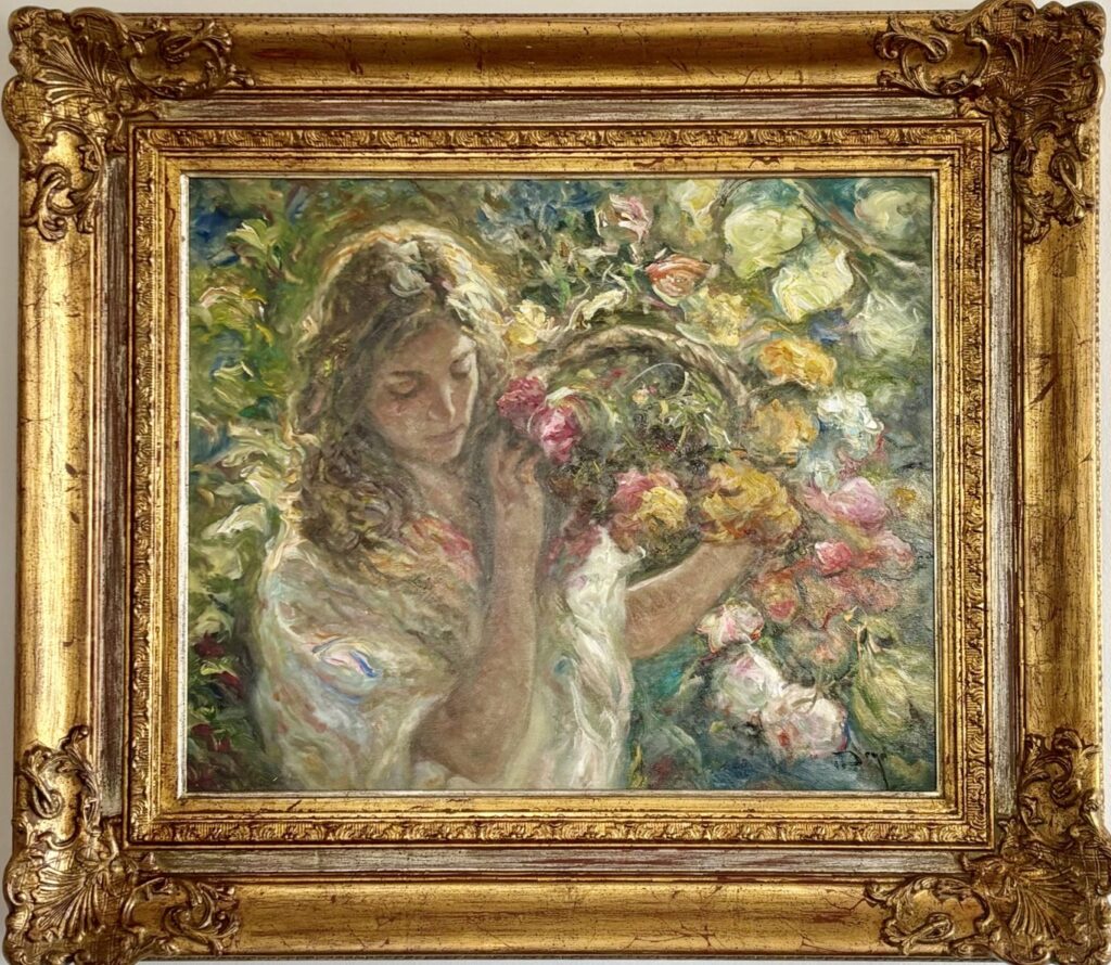 painting of a woman holding a basket of flowers in a gilded frame