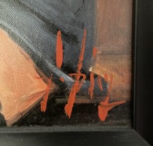 close-up of signature on artwork titled 'Saba on the Stairs' by Fabian Perez