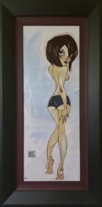 framed artwork of a stylized woman standing