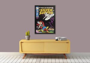 framed comic book cover of The Silver Surfer #4 by Stan Lee displayed on a wall above a modern console table