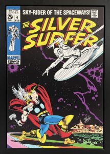 Comic book cover featuring a dynamic scene with the Silver Surfer and Thor.
