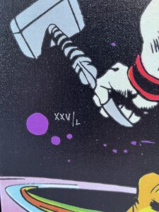 close-up of comic book artwork The Silver Surfer #4 featuring Thor's hammer with cosmic background