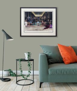 framed artwork titled 'Pink Floyd’s mother of all back catalogues' by Storm Thorgerson displayed on a wall above a green sofa with an orange cushion and a lamp nearby