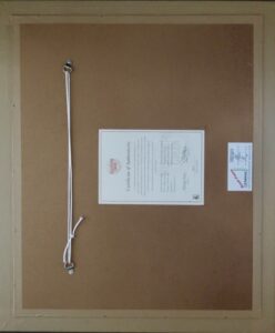 back of framed artwork with certificate of authenticity