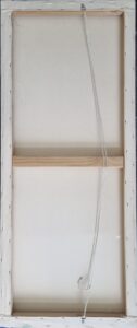 back view of a framed canvas artwork