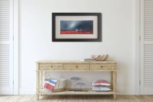 framed landscape artwork by Barry Hilton titled BPH267 displayed above a wooden console table in a room with white walls