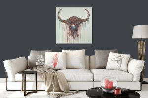 living room with abstract artwork of a cow by Robert Oxley