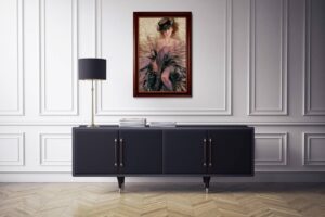 framed embellished limited edition artwork titled 'Black Tulle' by Irene Sheri displayed on a wall above a dark cabinet with a lamp