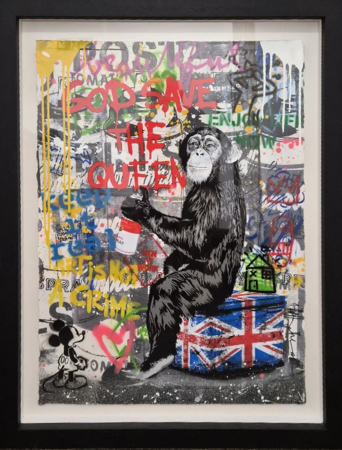 artwork featuring a chimpanzee with spray paint and graffiti elements
