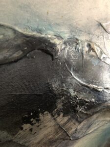 abstract oil artwork with textured layers in dark and light shades