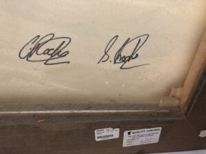 signatures of Chris and Steve Rocks on artwork 'Northern Sea III'.