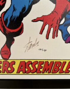 close-up of artwork titled 'The Avengers #58 - The Avengers Assemble' with signature