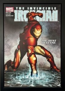 Stan Lee's The Invincible Iron Man #421 comic featuring Iron Man in a dynamic pose on a metallic surface